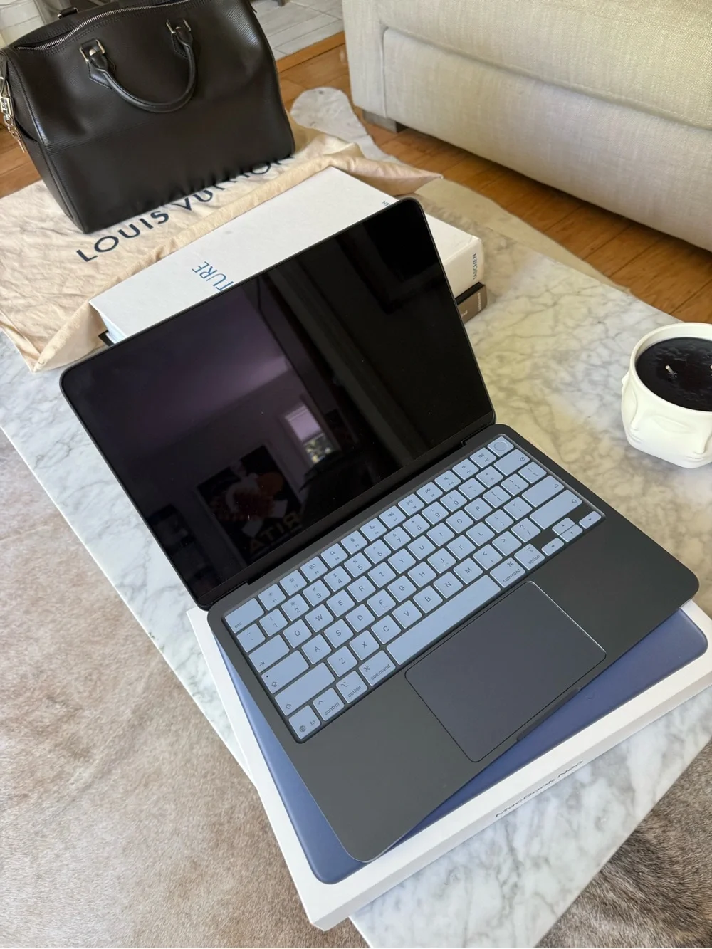 Apple MacBook Laptop in Indigo 8GB with 512 SSD storage in indigo Finish